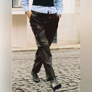 Zara faux leather elastic waist pants, size medium. Excellent condition.